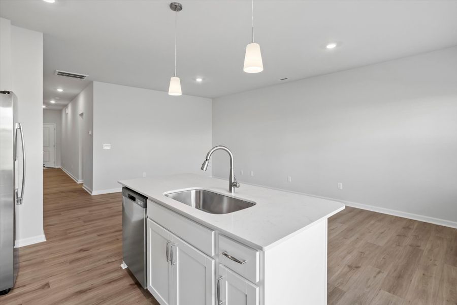 Furnished interior view inside a new home in West Main Townhomes, Sanford (Image 8).