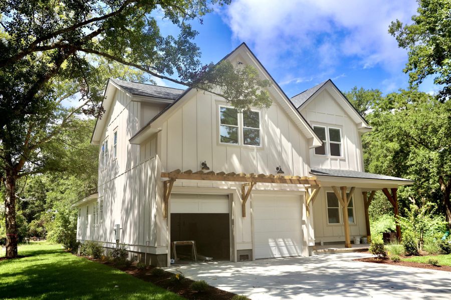 Front exterior of a new home in , Awendaw, SC, highlighting curb appeal (Image 21). Front exterior of a new home in , Awendaw, SC, highlighting curb appeal (Image 21).