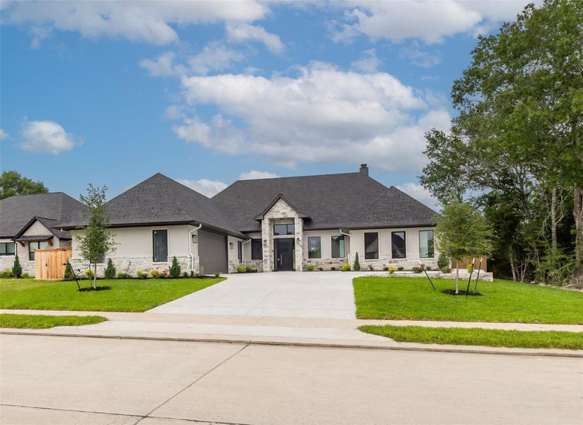 Front exterior of a new home in , College Station, TX, highlighting curb appeal (Image 29).