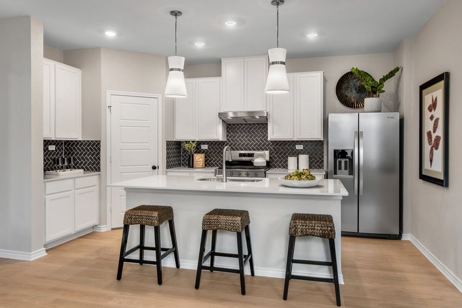 Furnished interior in a model home at Punta Verde in Converse (Image 9).