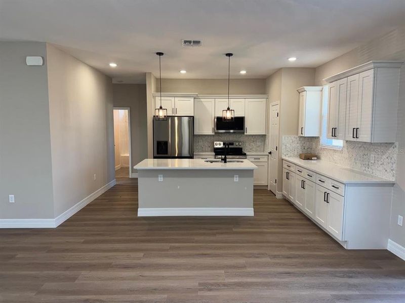 Furnished interior view inside a new home in , Ocala (Image 13).