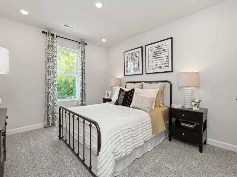 Furnished interior view inside a new home in The Coves at Lakes of Cane Bay, Summerville (Image 6).