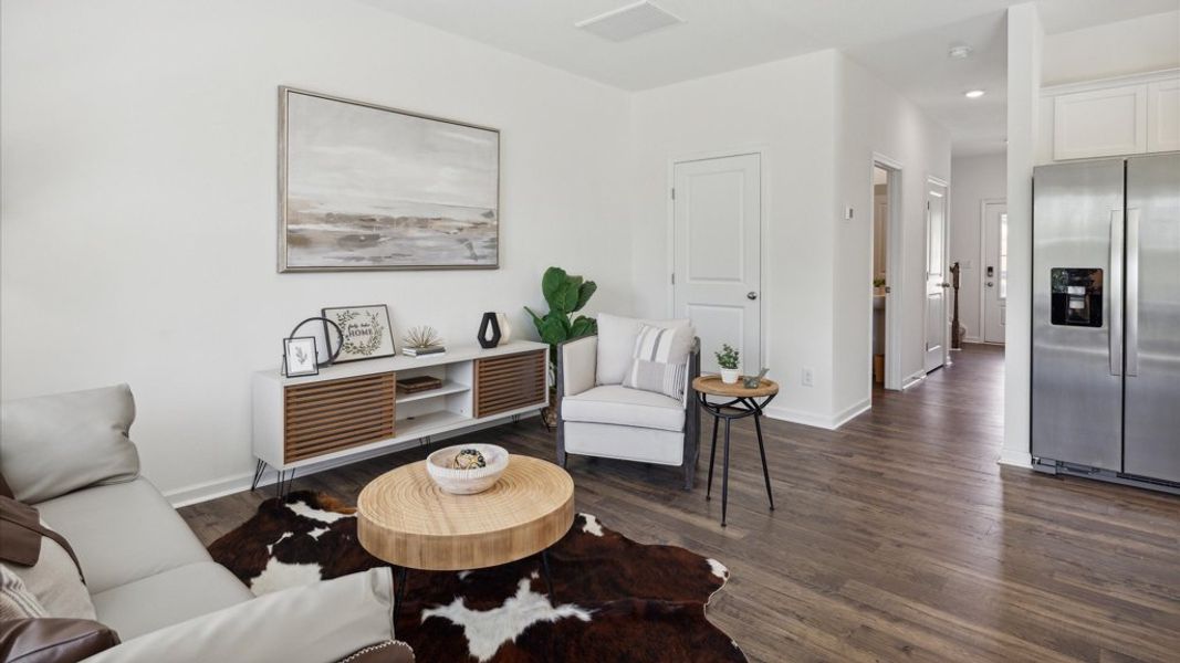 Representative furnished interior of a home built from the Altamont Townhome by D.R. Horton in Saint Marc's, Powell (Image 9).