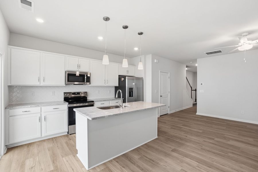 Furnished interior view inside a new home in Sloan Station, Charlotte (Image 7).