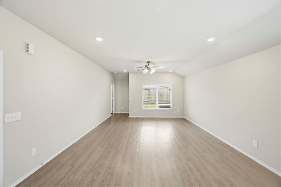 The living room with a neutral color scheme is ready for you to make it your own.