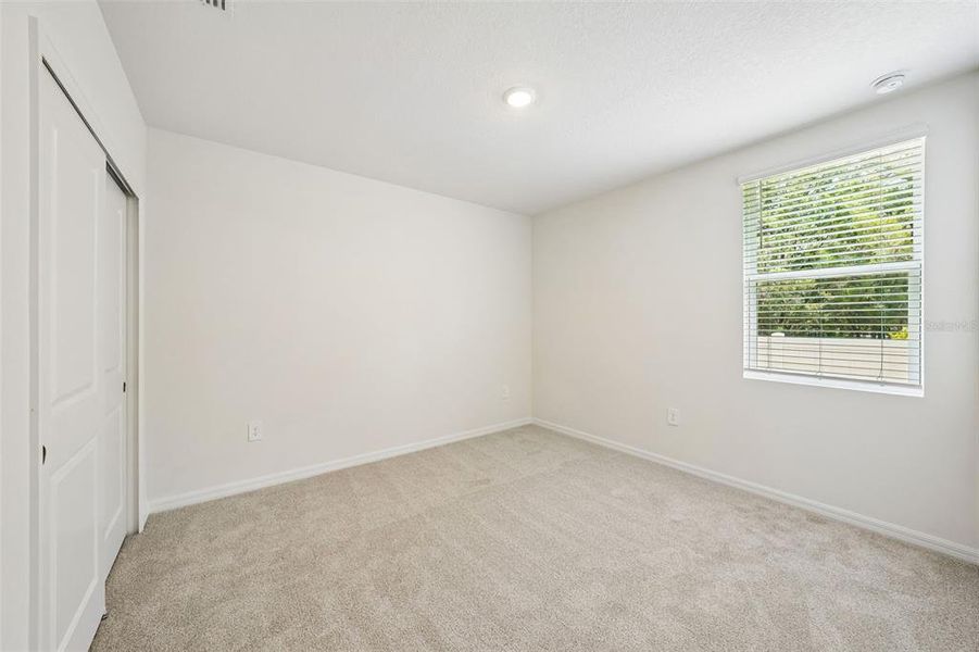 Spacious, unfurnished interior of a new home in Pine Ridge Meadows, Hudson (Image 41).