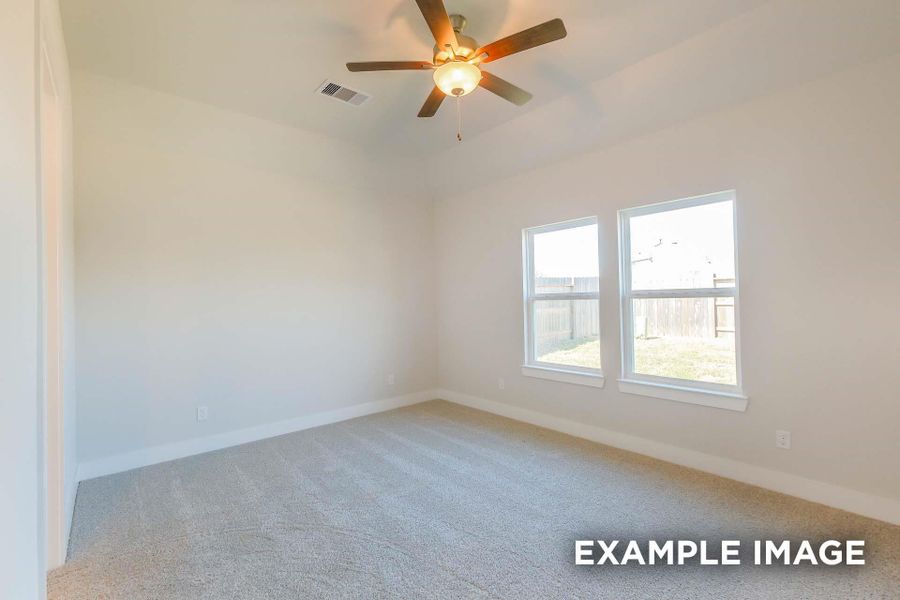 Spacious, unfurnished interior of a new home in Sunterra, Katy (Image 19).