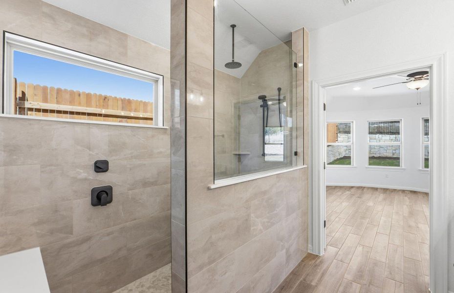 Furnished interior view inside a new home in West Cypress Hills, Spicewood (Image 9).