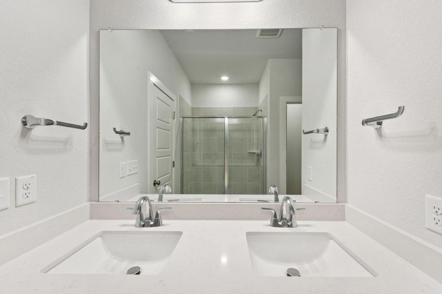 Furnished interior view inside a new home in Stallion Run, Buda (Image 8).