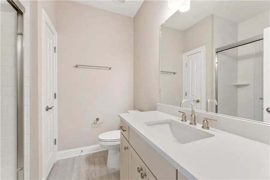 Furnished interior view inside a new home in The Courtyards at Bailey Farms, Dacula (Image 4).