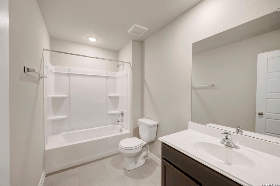 Furnished interior view inside a new home in Greenspoint Heights, Seguin (Image 7).