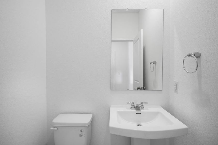 Furnished interior view inside a new home in Longview 40s, Del Valle (Image 6).