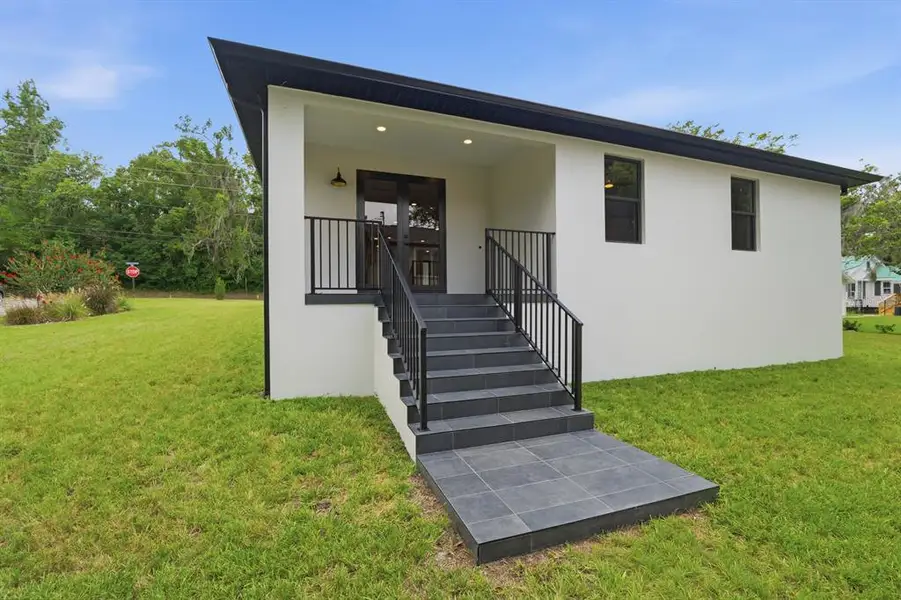 Exterior details and patio area of a home in , Brooksville (Image 4).