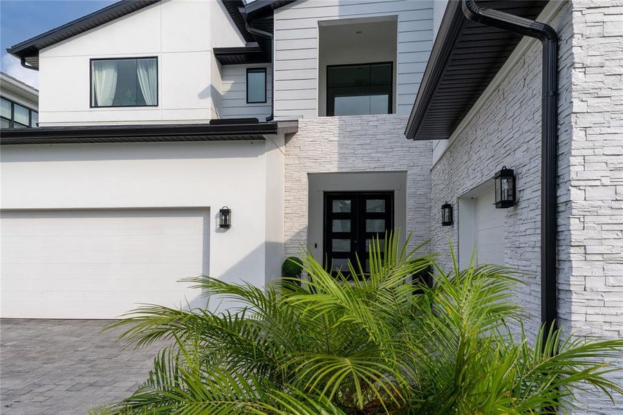Front exterior of a new home in , Orlando, FL, highlighting curb appeal (Image 18).