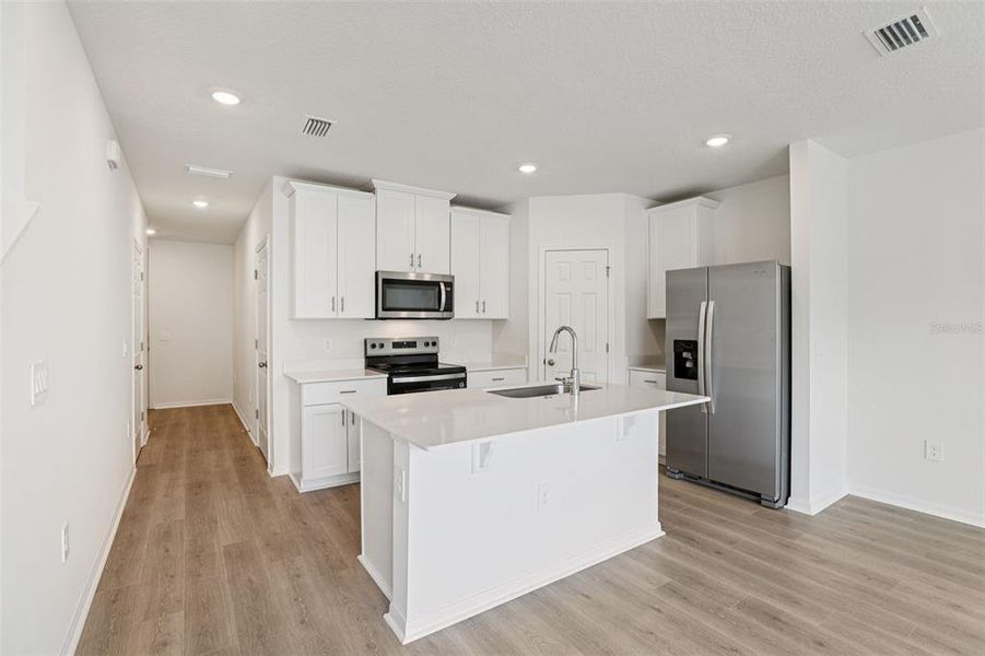 Furnished interior view inside a new home in Cagan Crossings West, Clermont (Image 15).