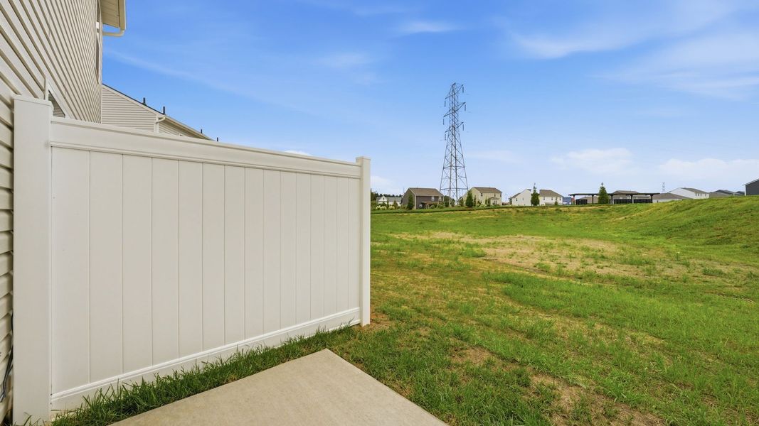 Exterior details and patio area of a home in Fieldcrest Acres Townhomes, Blountville (Image 16).