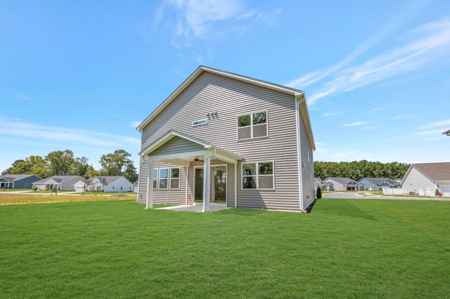 Exterior details and patio area of a home in Providence Creek, Fuquay Varina (Image 4).