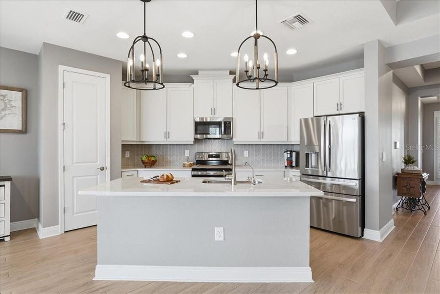 Furnished interior view inside a new home in Cypress Glen at River Wilderness, Parrish (Image 6).