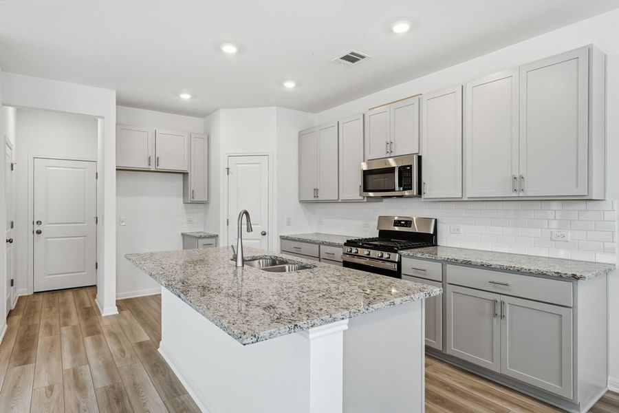 Furnished interior view inside a new home in Longview, Del Valle (Image 6).