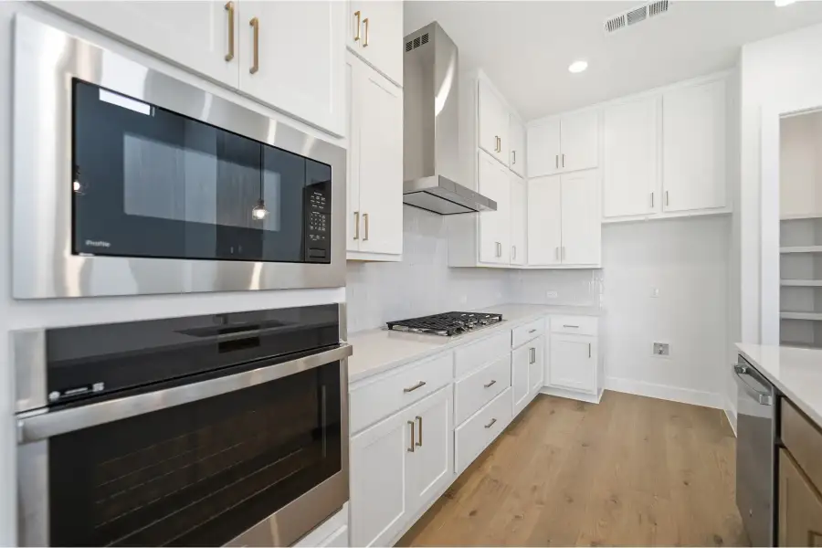 Furnished interior view inside a new home in Green Meadows, Celina (Image 12).