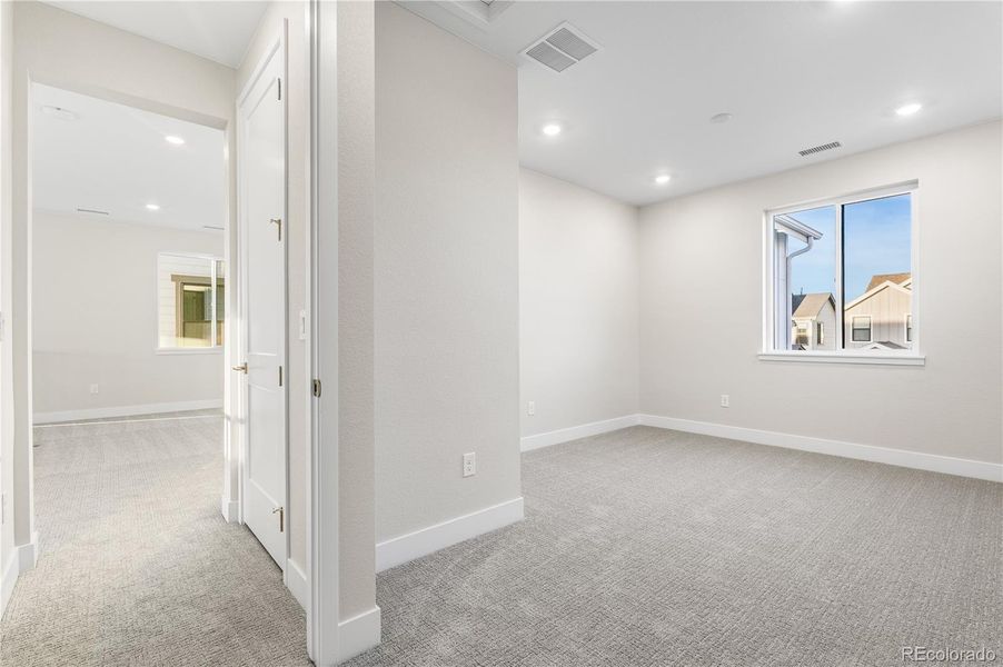 Spacious, unfurnished interior of a new home in Stargaze at Solstice, Littleton (Image 26).