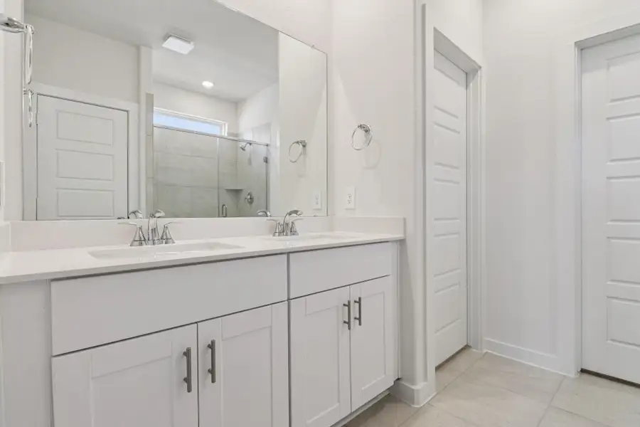Furnished interior view inside a new home in Pine Lake Cove - Traditional Series, Montgomery (Image 11).