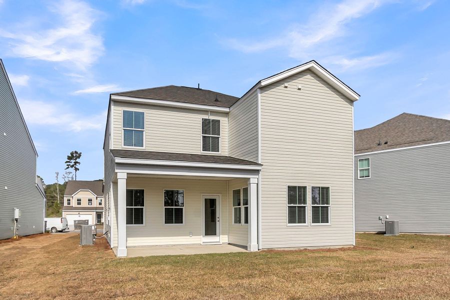 Exterior details and patio area of a home in Wildcat Chase, Summerville (Image 3).