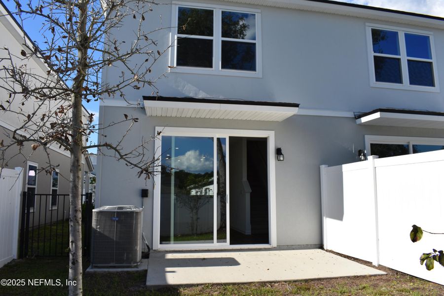 Exterior details and patio area of a home in Irongate Villas, Jacksonville (Image 3).