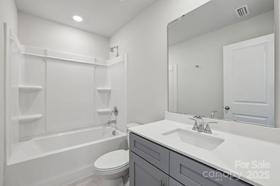 Photo is not of the actual home, but is an inspirational photo of builder’s model home and may depict options, furnishings, and/or decorator features that are not included Photo is not of the actual home, but is an inspirational photo of builder’s model home and may depict options, furnishings, and/or decorator features that are not included