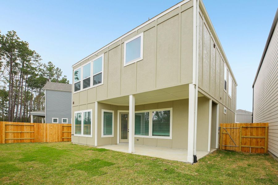 Exterior details and patio area of a home in Pinewood Trails - Luxe Series, Atascocita (Image 26). Exterior details and patio area of a home in Pinewood Trails - Luxe Series, Atascocita (Image 26).