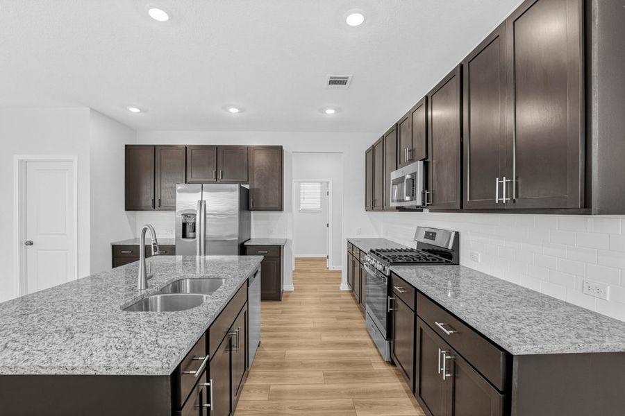 Furnished interior view inside a new home in Sunfield, Buda (Image 7).