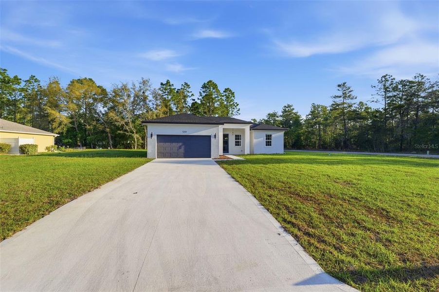 Front exterior of a new home in , Dunnellon, FL, highlighting curb appeal (Image 19). Front exterior of a new home in , Dunnellon, FL, highlighting curb appeal (Image 19).