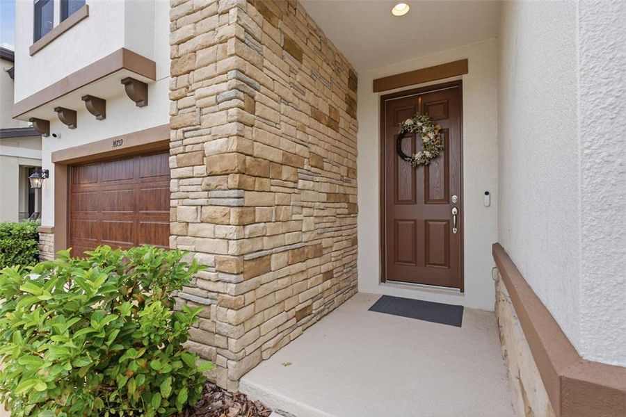 Exterior details and patio area of a home in Hawkstone, Lithia (Image 29).