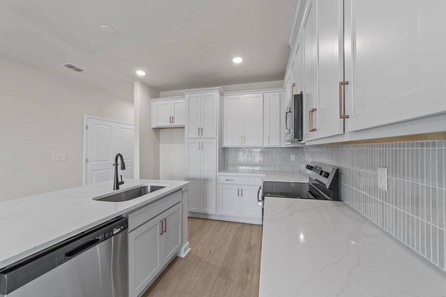 Furnished interior view inside a new home in Blue Heron Retreat, Little River (Image 7).