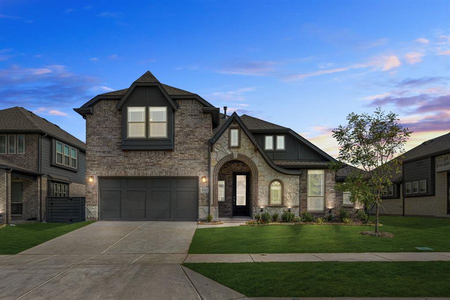 Front exterior of a new home in Union Park Classic 60, Little Elm, TX, highlighting curb appeal (Image 25). Front exterior of a new home in Union Park Classic 60, Little Elm, TX, highlighting curb appeal (Image 25).