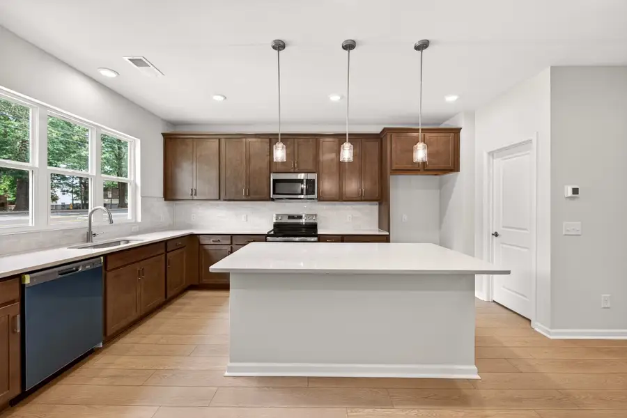 Furnished interior view inside a new home in Amplitude, Charlotte (Image 7).