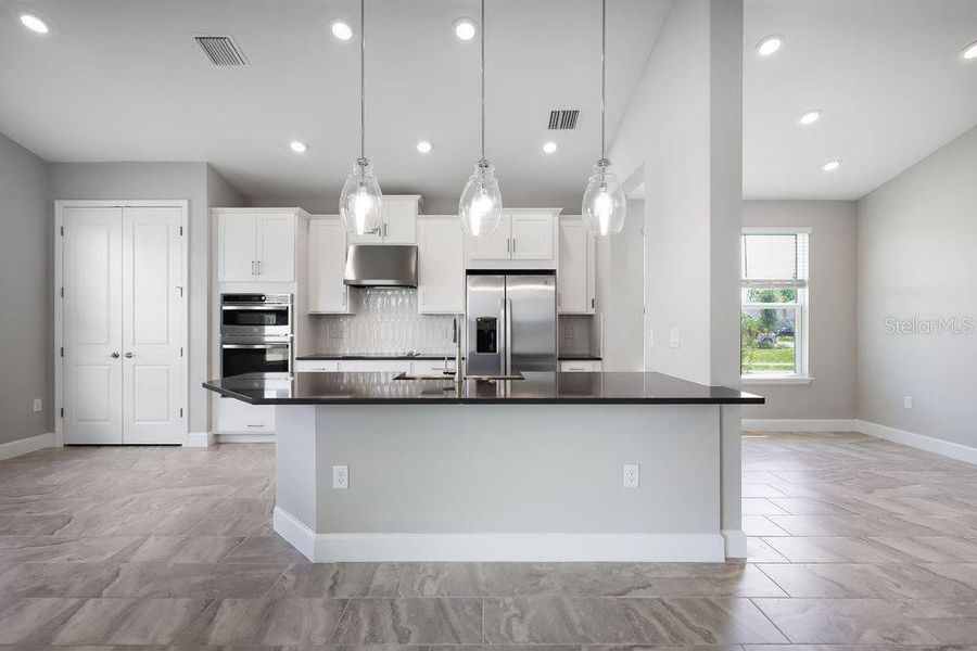 Furnished interior view inside a new home in Colbert Landings, Palm Coast (Image 11).