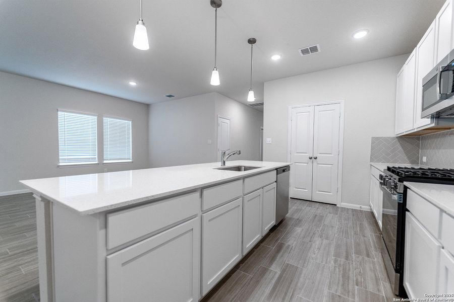 Furnished interior view inside a new home in Hunter's Ranch, San Antonio (Image 7). Furnished interior view inside a new home in Hunter's Ranch, San Antonio (Image 7).