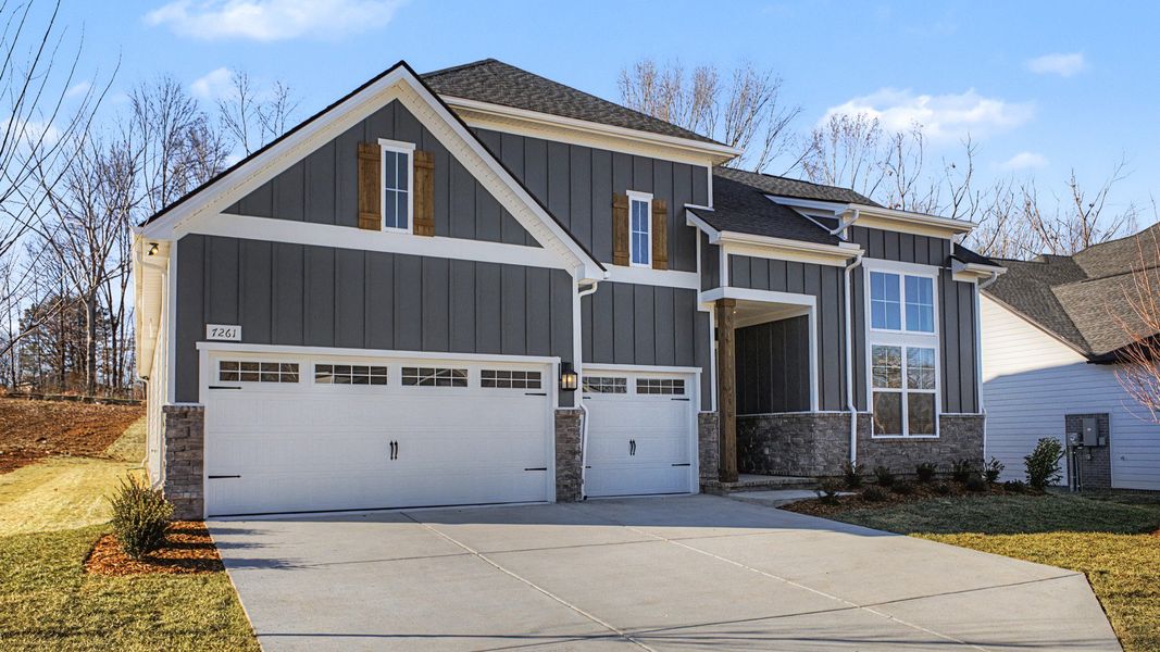 Front exterior of a new home in Brush Creek, Fairview, TN, highlighting curb appeal (Image 19).