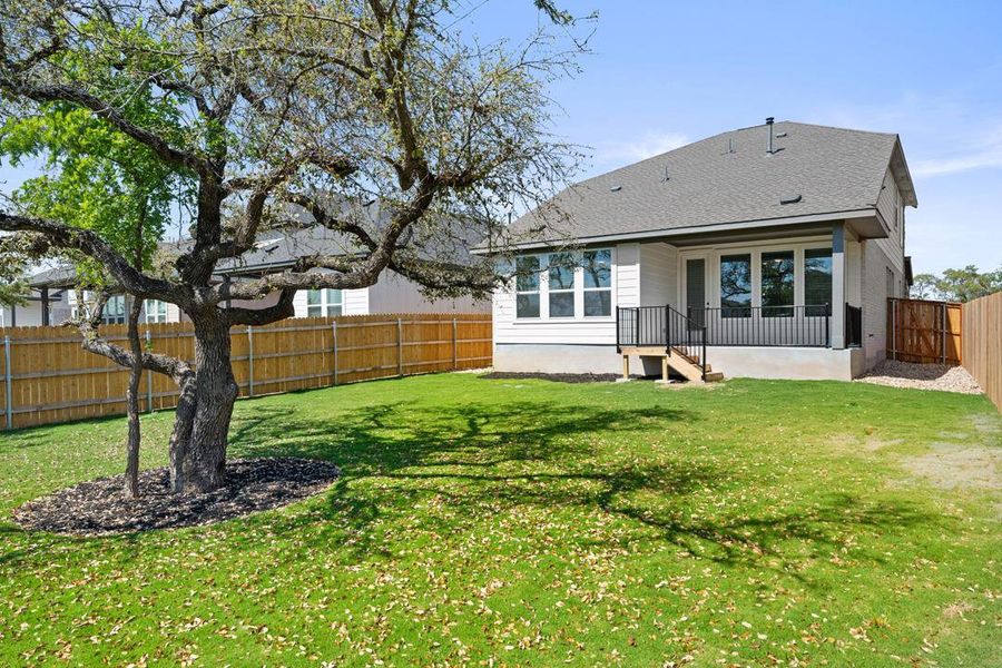 Exterior details and patio area of a home in Heritage, Dripping Springs (Image 4).