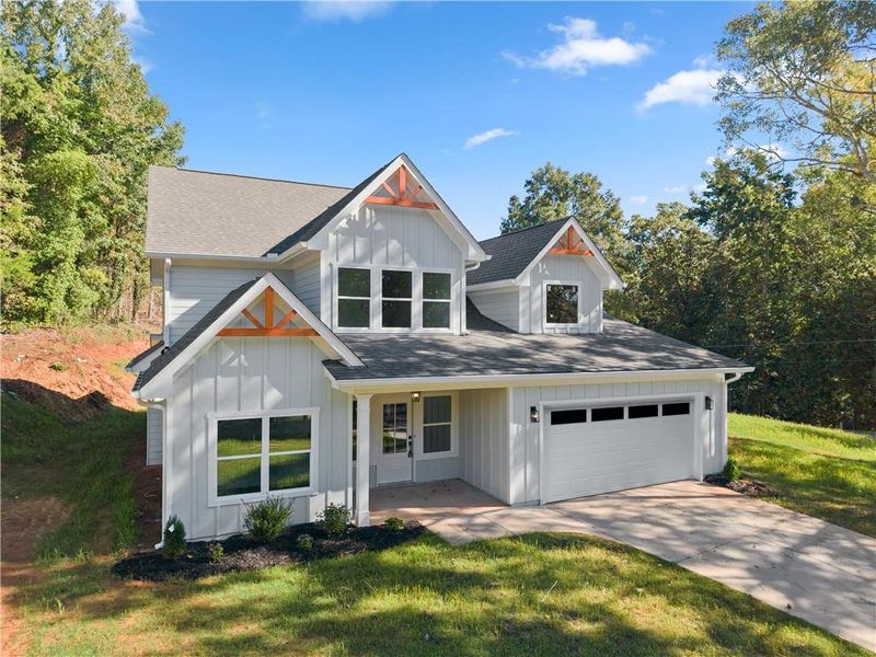 Front exterior of a new home in , Gainesville, GA, highlighting curb appeal (Image 19).