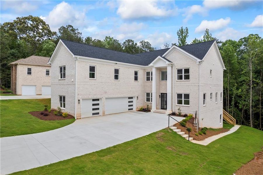 Front exterior of a new home in , Fairburn, GA, highlighting curb appeal (Image 25).