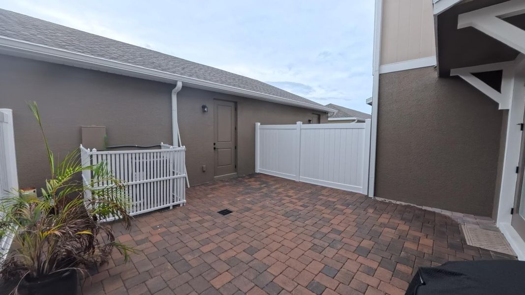 Front exterior of a new home in , Winter Garden, FL, highlighting curb appeal (Image 2).