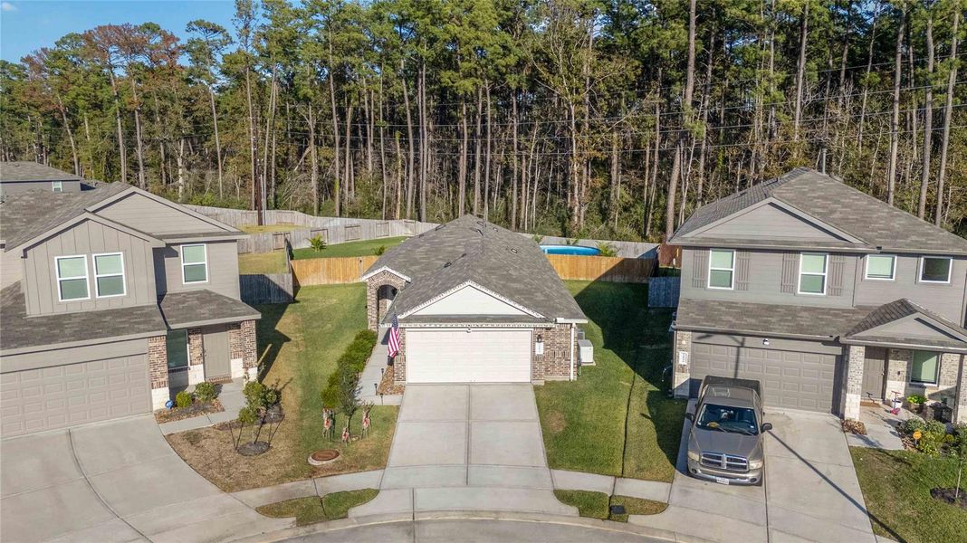 Front exterior of a new home in , Spring, TX, highlighting curb appeal (Image 21). Front exterior of a new home in , Spring, TX, highlighting curb appeal (Image 21).