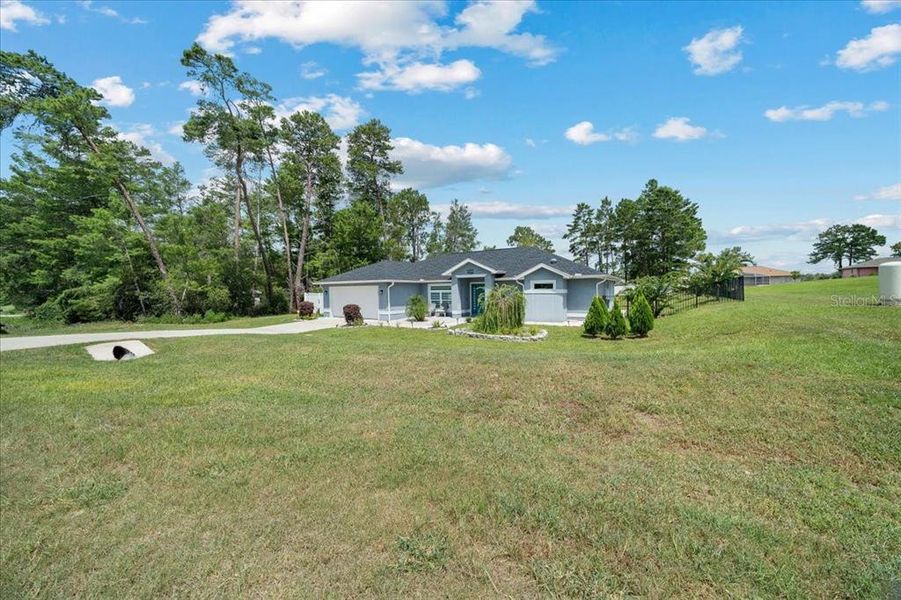 Front exterior of a new home in , Ocala, FL, highlighting curb appeal (Image 2). Front exterior of a new home in , Ocala, FL, highlighting curb appeal (Image 2).