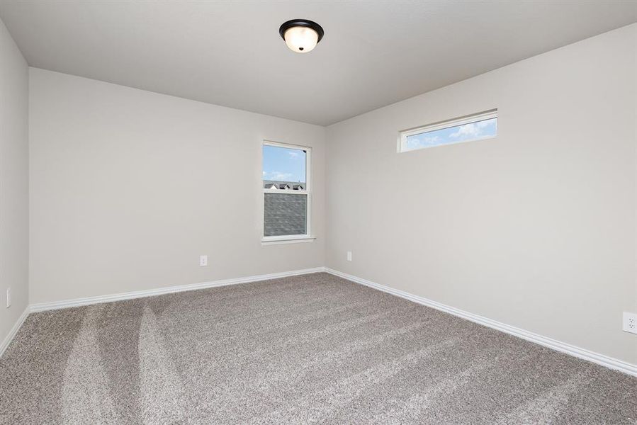 Unfurnished room featuring carpet floors