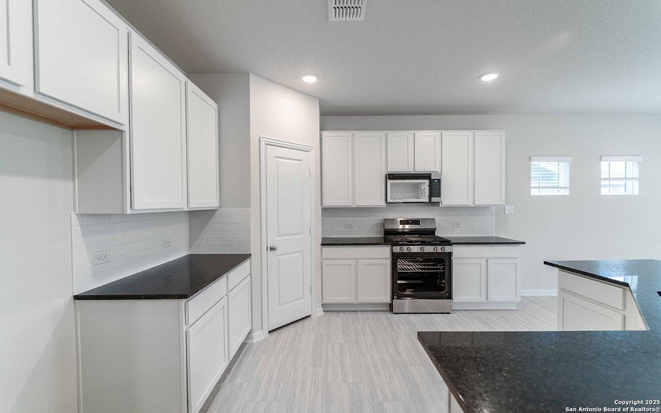 Furnished interior view inside a new home in Hickory Ridge, Elmendorf (Image 4).