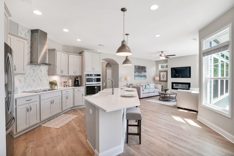 Representative furnished interior of a home built from the Portico by McKee Homes in The Cottages at 78 North, Sanford (Image 7).
