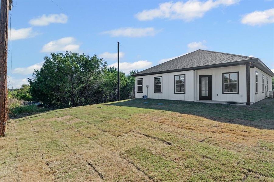 Exterior details and patio area of a home in , Granbury (Image 27).