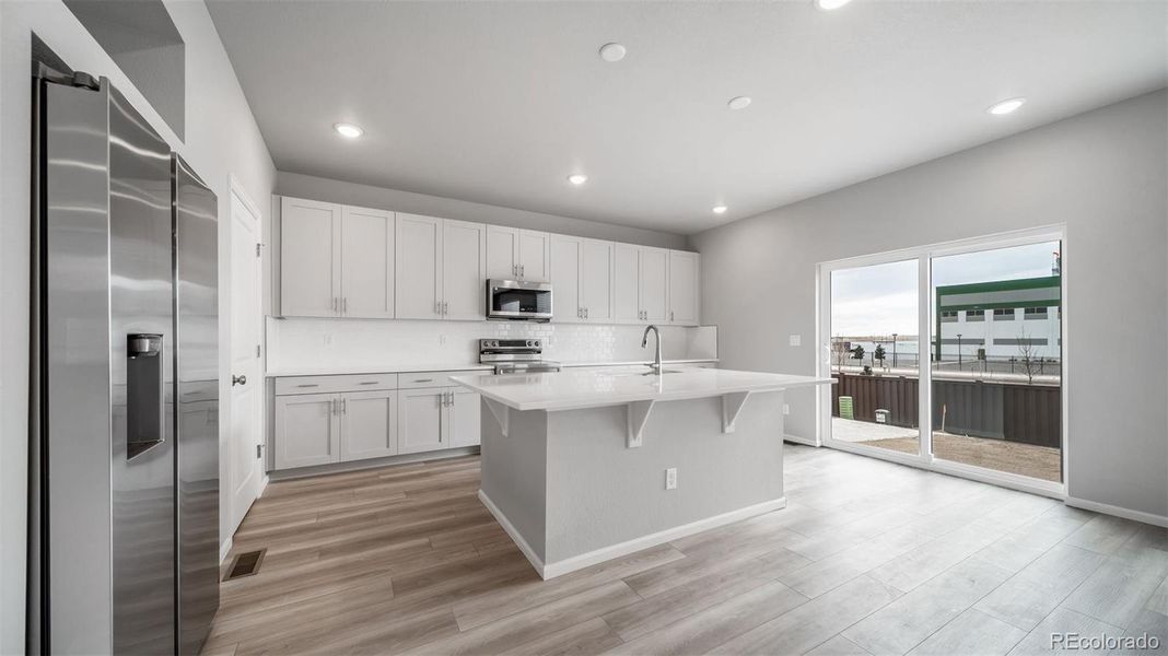 Furnished interior view inside a new home in , Aurora (Image 6).